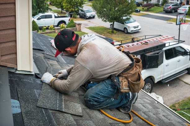 Professional Roofing technician working in Easton, MA